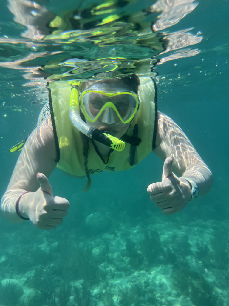 Madi (author) underwater with her snorkel gear at Biscayne National Park. 