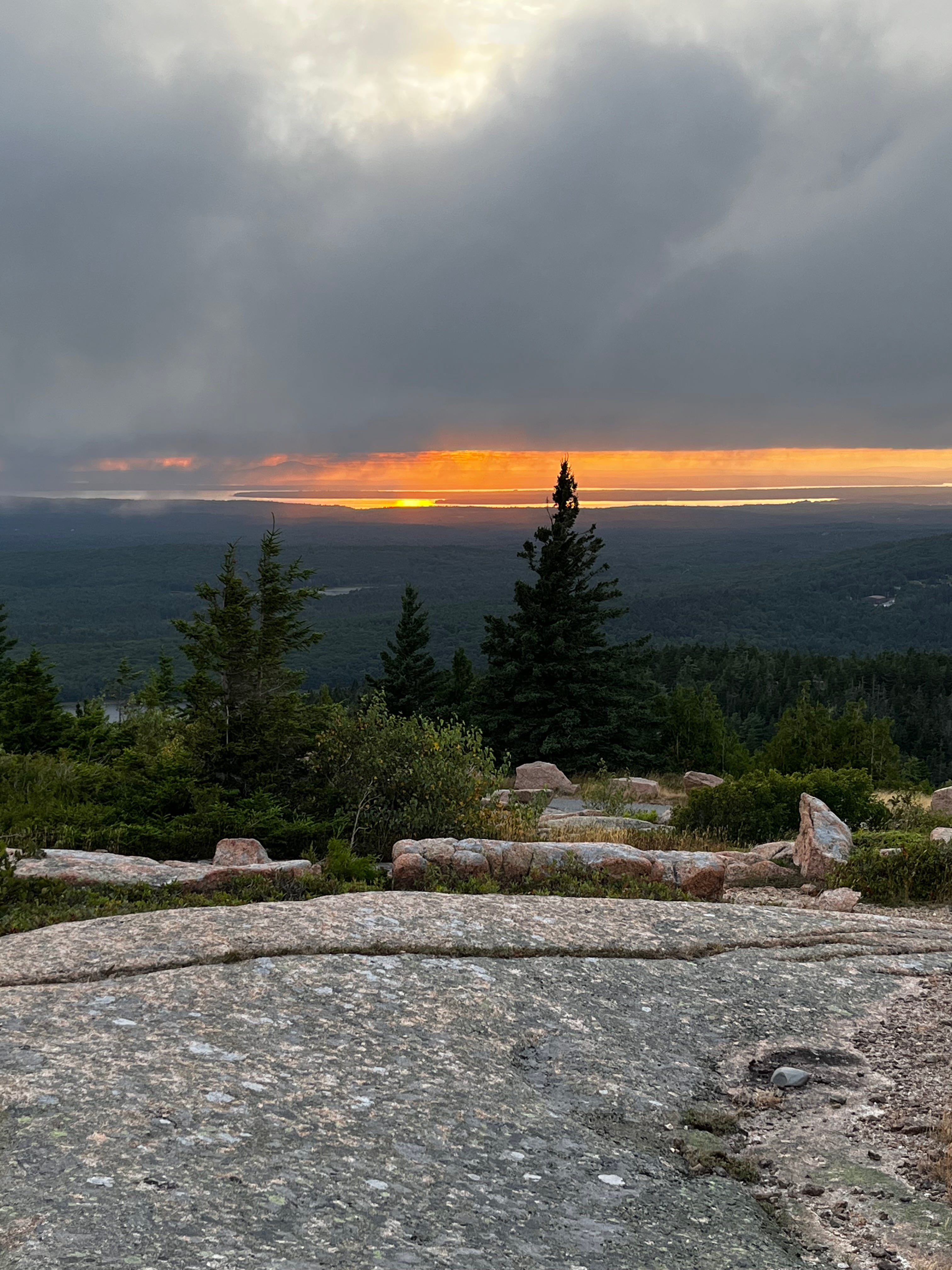 A cloudy sunset view from Cadillac mountain summit.