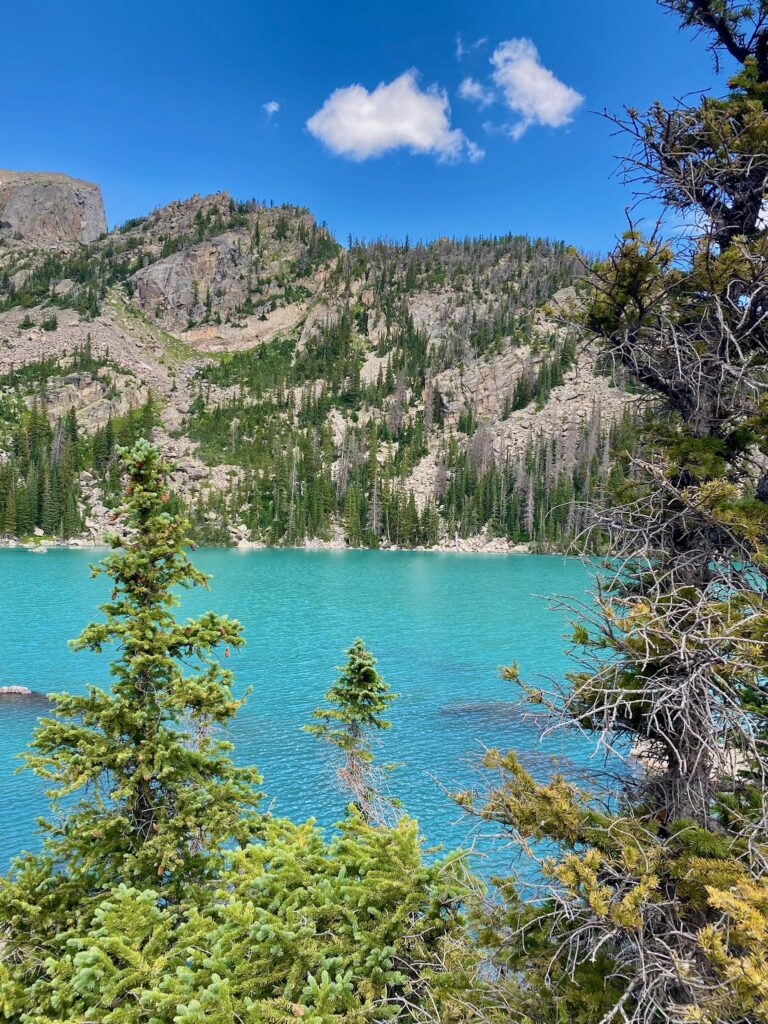 Lake Haiyaha in Rocky Mountain National Park. Aqua blue lake with mountains in the background. 