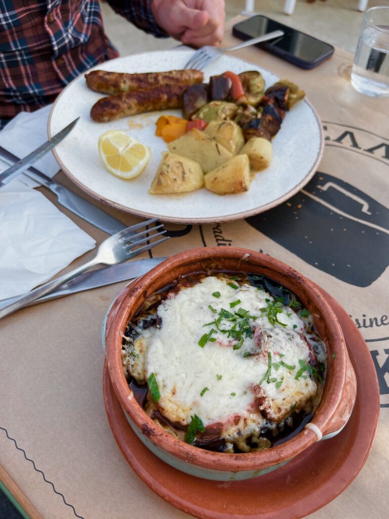 A delectable dinner from Naxos restaurant To Elliniko, featuring a plate of Kalogeros. The dish showcases the culinary expertise with fresh ingredients, presenting a delightful combination of flavors and textures, reflecting the rich gastronomic heritage of Naxos. This restaurant is a must on your Naxos Itinerary.