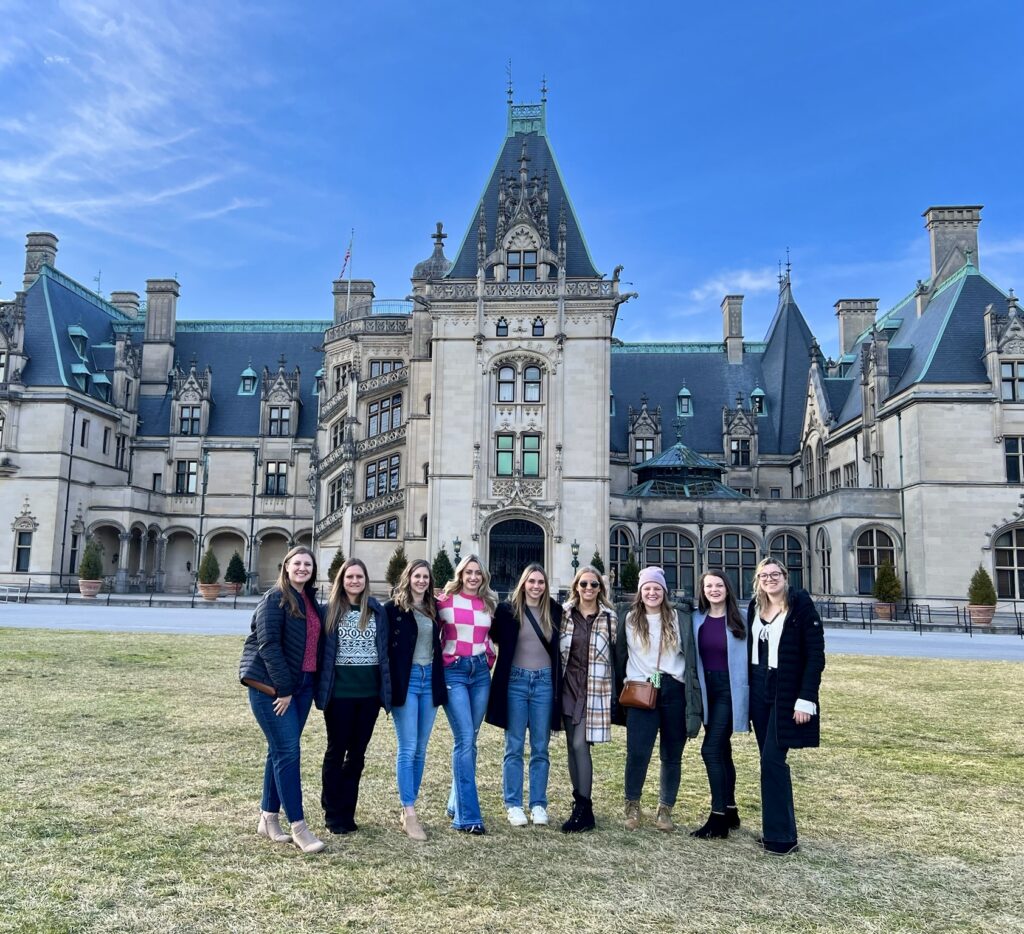 Asheville bachelorette party group in front of the Biltmore Estate.