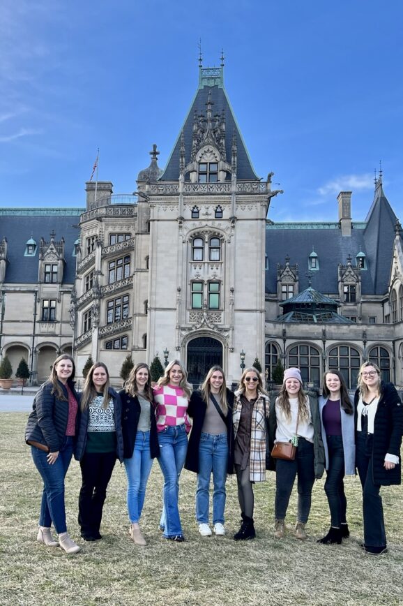 Asheville bachelorette party group in front of the Biltmore Estate.