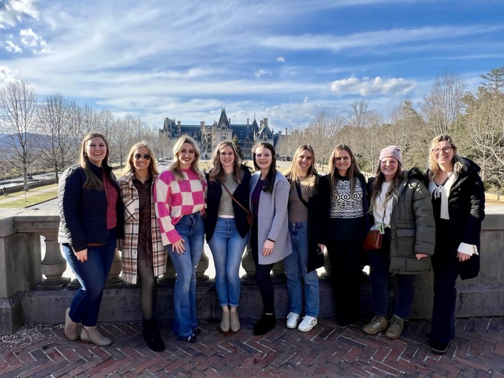 Asheville bachelorette party group in front of the Biltmore Estate.